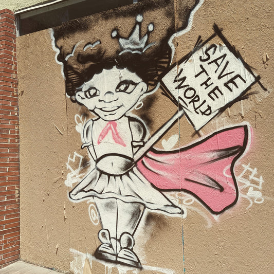 Graffiti of girl holding a sign "Save the World" . Thing freediver should consider