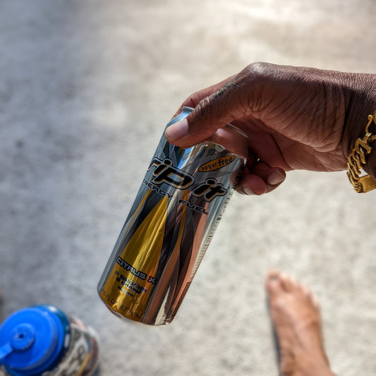 Freediver holding a Rip-It energy drink
