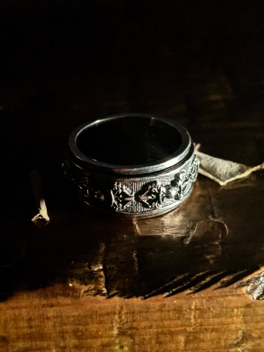 Silver Buddhist ring worn by many freedivers.  Has a varja around the circumference.  